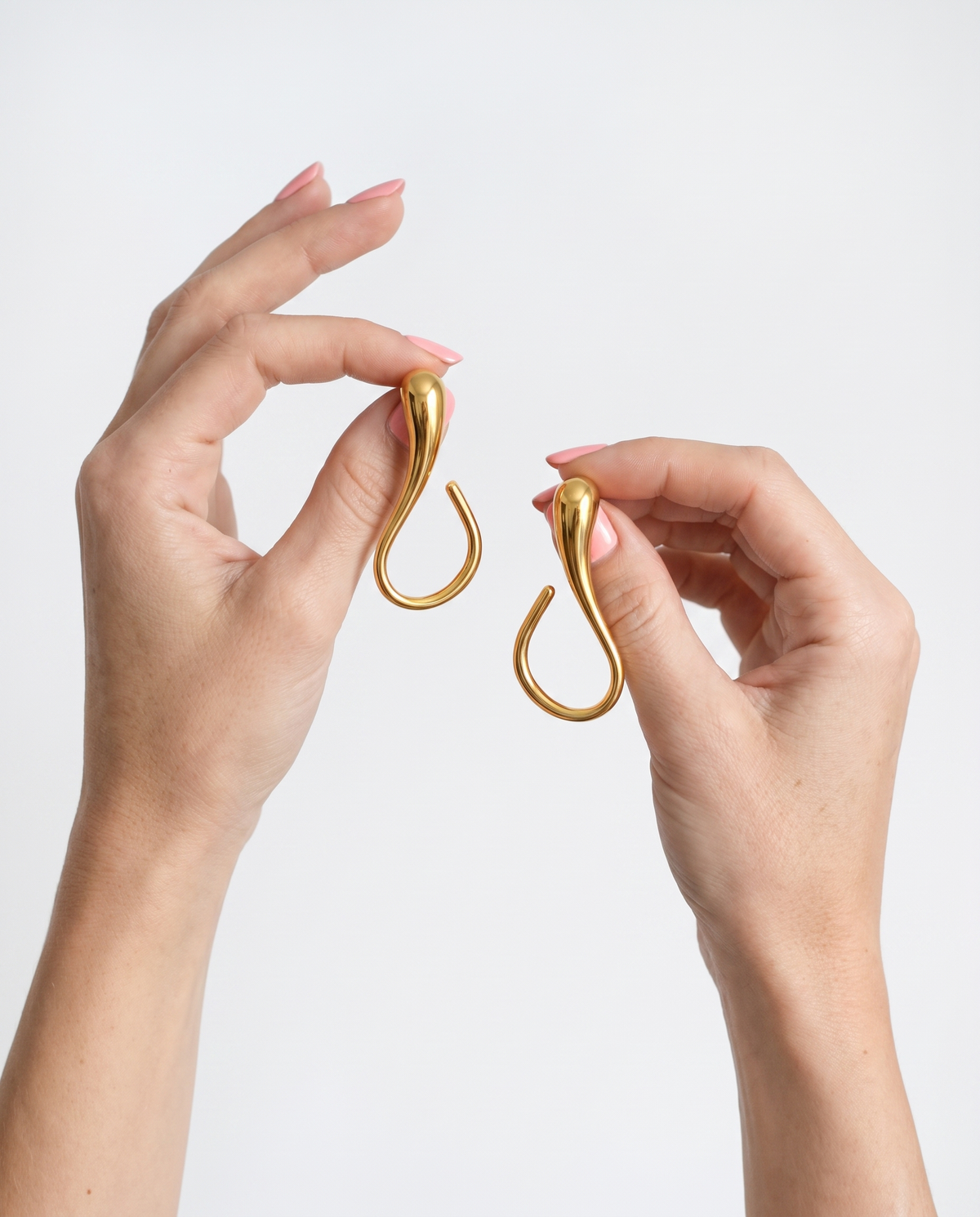 Sleek Curve Gold Drop Earrings